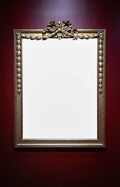 istock Decorative gold picture frame on red wall 2230394631