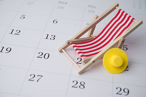 istock Red beach chair and hat on white blank calendar background copy space. 2230394815