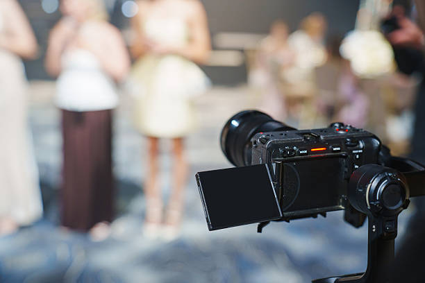 istock Camera focused on a group of people enjoying a celebration indoors 2230398995