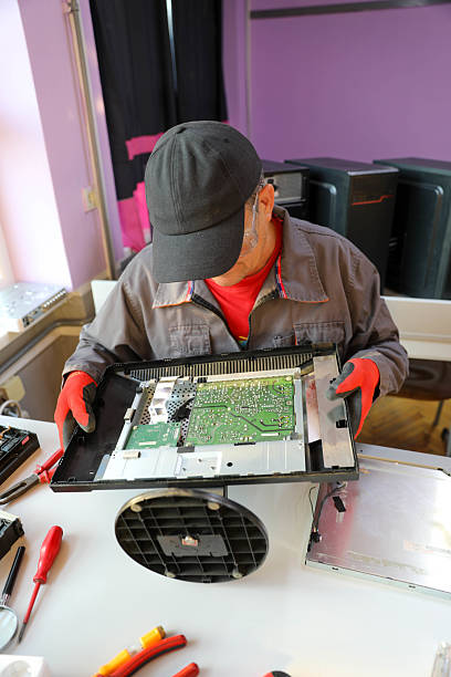 istock Mature Engineer Working On Monitor In Service Workshop 2230400273