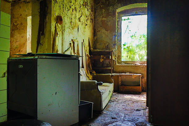 lost place photo of an empty room with old fashioned furniture
