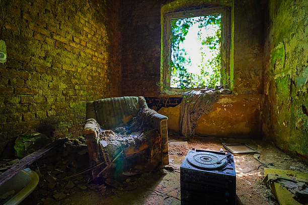 old furniture in empty room ruins