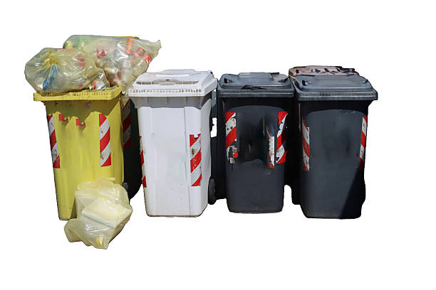 istock Overflowing wheelie bins representing waste management challenges 2230400634