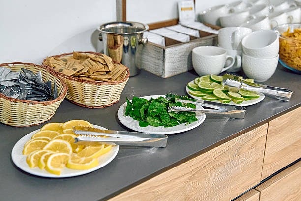 istock An Array of Fresh Garnishes and Condiments Featuring Lime, Lemon, and Mint for a Refreshing Beverage Experience 2230401927