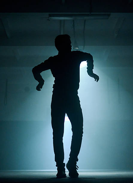 istock Hip Hop Male Dancer Performing, Silhouette 2230408575