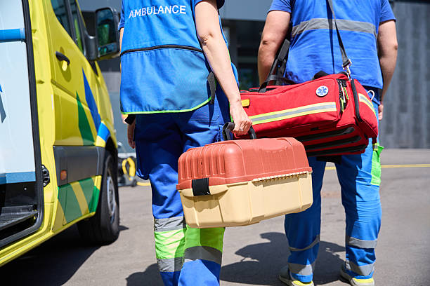 istock EMTs transporting medical equipment for urgent care 2230422924