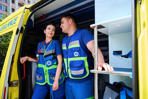 istock Medical staff inside emergency vehicle looking each other 2230422930