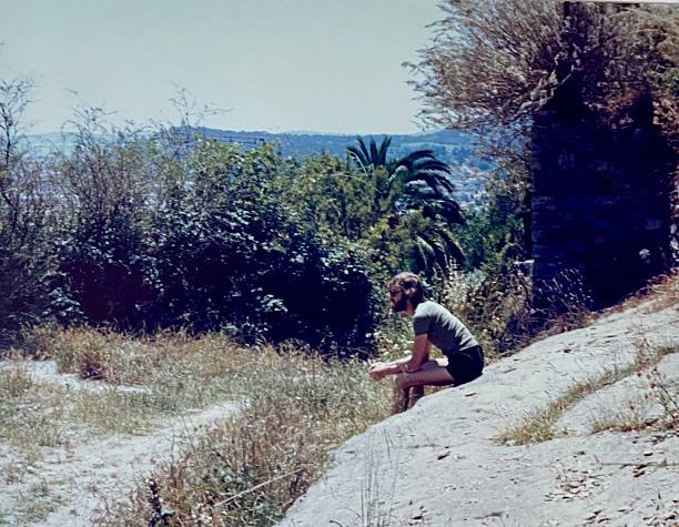 istock Young Man on Vacation in the Seventies. 2230423746