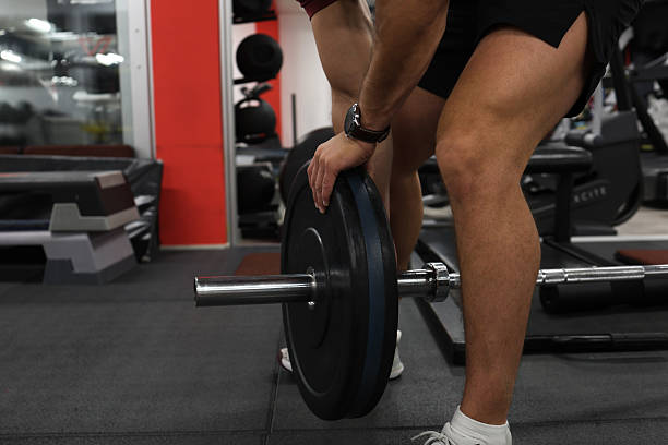 istock Worker at the gym preparing for closing the shift 2230427849