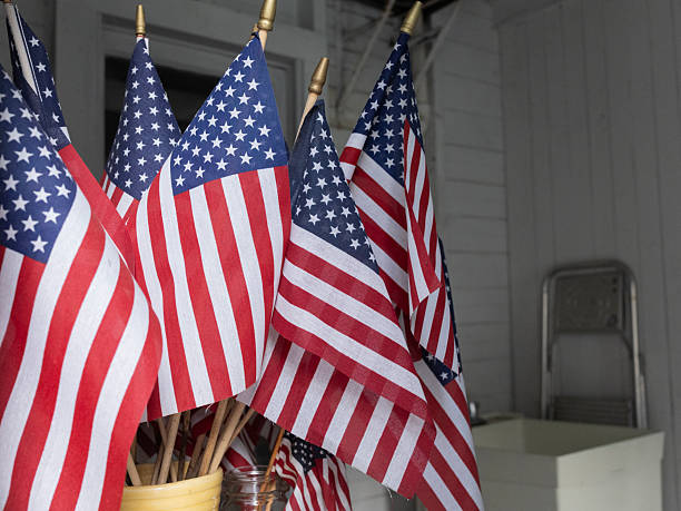 istock Decorative American flags stored on gardening bench for use on holidays 2230432285