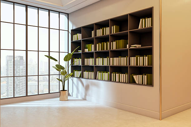Modern office interior with wall bookshelves and city view through large window, featuring minimal design and natural light ambiance. 3D Rendering