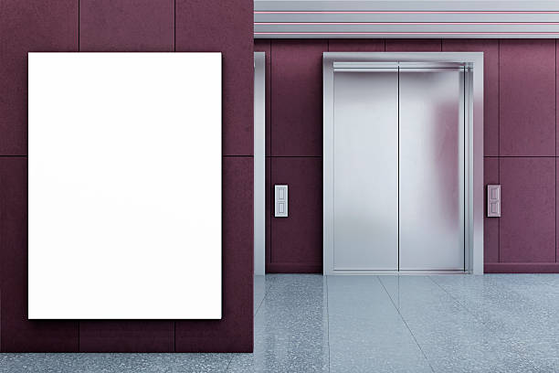 istock Vertical blank poster mockup on wall near hotel elevator doors in modern business lobby interior with clean design and polished floor tiles. 3D Rendering 2230432435