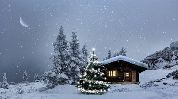 Christmas atmosphere with a mountain hut in the snow