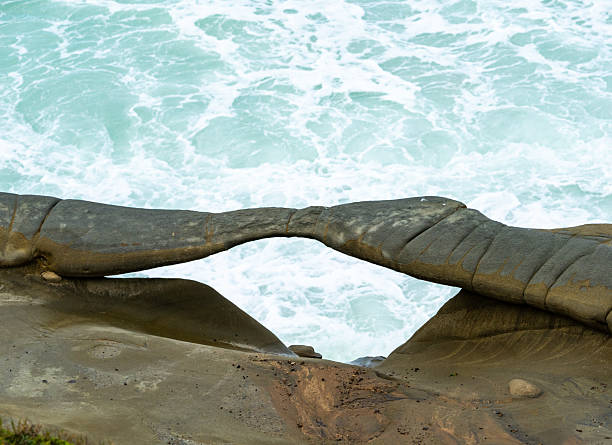 Kurnell, NSW, Australia: sandstone cliffs of Cape Baily track - scenic coastal walk between Cape Solander and the Cape Baily Lighthouse - Kamay Botany Bay National Park - Pacific Ocean.