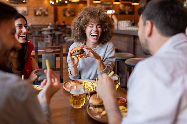 istock Casual Weekend Dining with Burgers and Beer 2230468926
