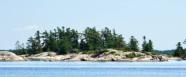 istock Weathered smooth granite island in Georgian Bay 2230480623