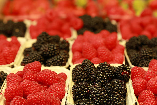 Baskets of blackberries and blueberries