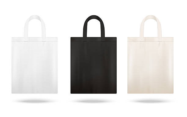 istock Reusable shopping tote bag mockup set with different fabric colors 2230482938