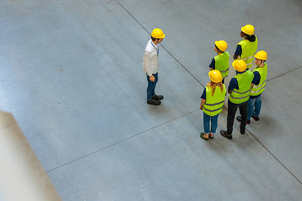 istock Warehouse workers on a meeting with their manager 2230483742