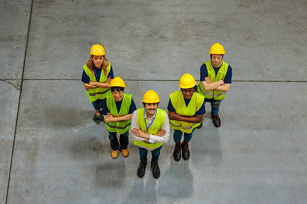 istock A group of warehouse workers posing for a photo 2230483756