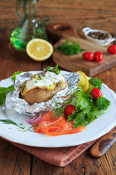 istock Baked potato with herb quark and smoked salmon 2230487202