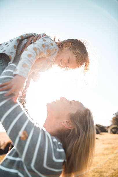 istock mother and daughter playing together 2230489528