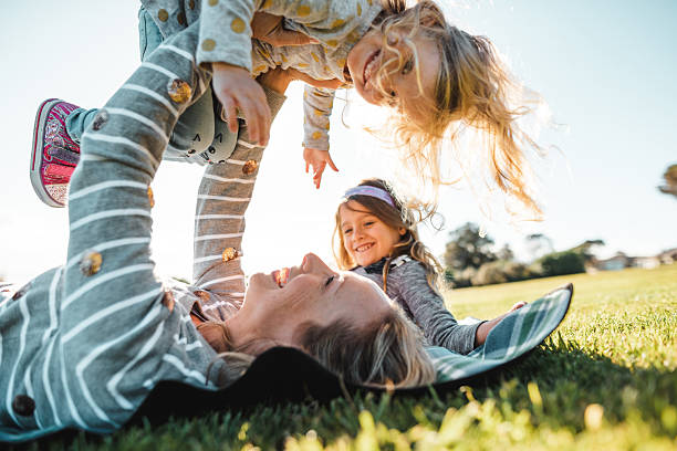 istock mother and daughter playing together 2230489737
