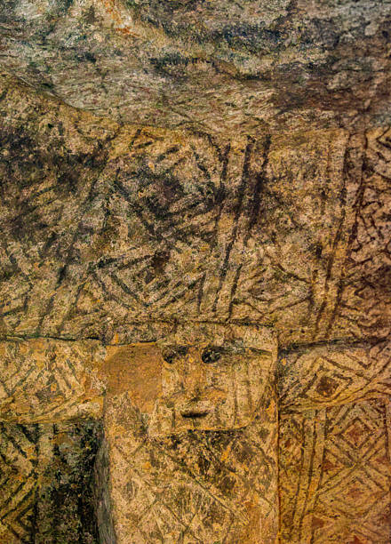 Ancient wall painting inside an Etruscan tomb in Tarquinia, Italy. This archaeological fresco, dating back to the Etruscan civilization of the 7th–3rd century BC, is part of the UNESCO World Heritage necropolis, offering a unique testimony of early Italic funerary art.