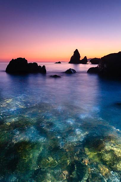 istock Scenic coastal view at sunset with rocky formations. 2230499992