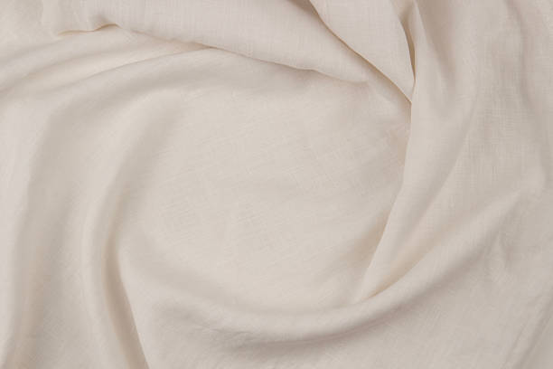 istock Natural linen fabric arranged in a circular drapery frame, soft folds and organic texture, neutral background 2230501660
