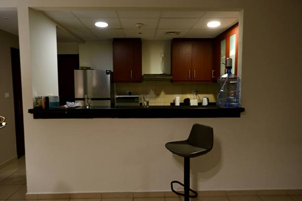 istock Modern Apartment Kitchen with Counter and Bar Stool 2230501798