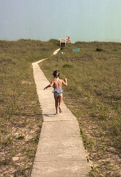 Cape Hatteras NS - Girl  on Boardwalk - 1983. Scanned from Kodachrome 25 slide.