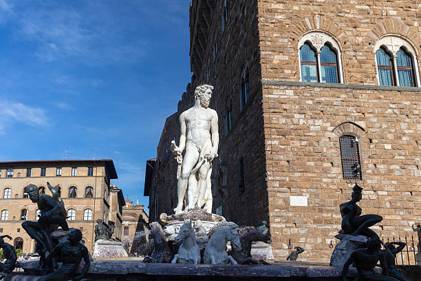 Striking bronze statues against Florence's famous cityscape, embodying the rich mythological history and allure of Italy