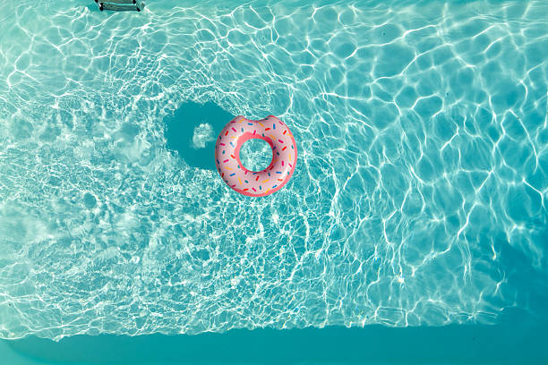 istock Inflatable Swimming Ring in Swimming pool 2230509783