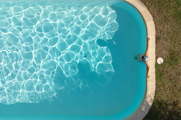 Young woman relaxing in Swimming pool