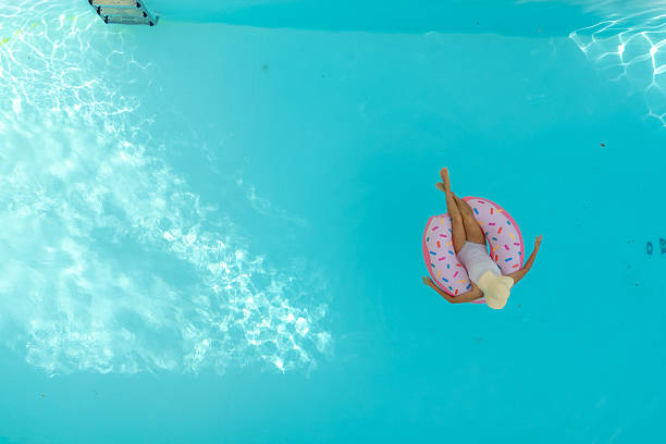 istock Girl with swim ring 2230511854