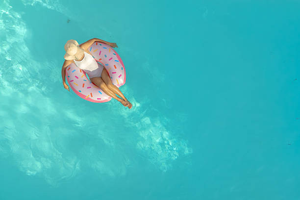 istock Girl with swim ring 2230512309