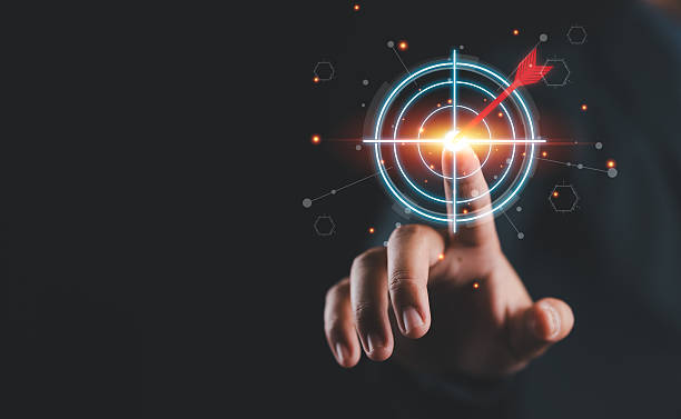 istock Businessman hand touching to target dart board for setup and achievement objectives target for business investment concept. 2230521671