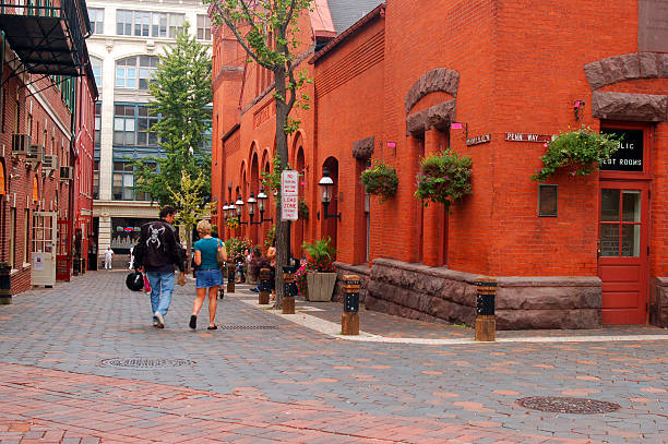 Lancaster, PA, USA September 18 An adult couple walks in the alley near the historic Central Market in the heart of downtown Lancaster, Pannsylvania