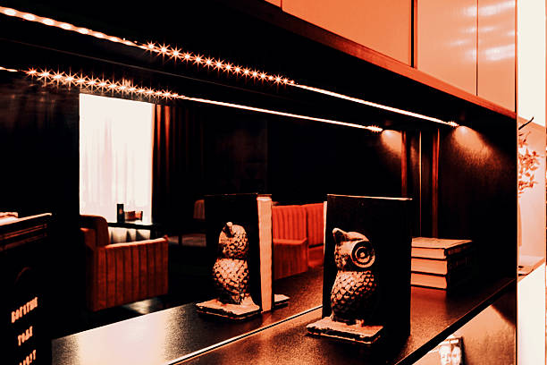 istock Decorative shelving and lounge bar interior through reflection in the mirror, blur stylization. 2230531961
