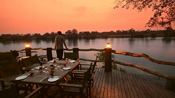 istock Tranquil Riverside Dining Setting at Sunset in Kafue National Park 2230541736