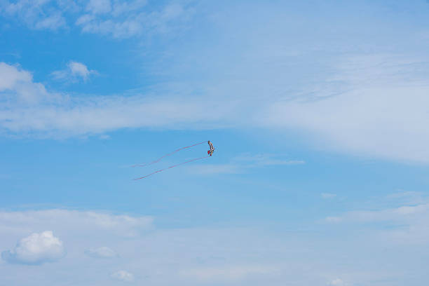 istock Dragon in blue sky with few clouds 2230549259