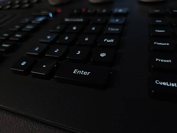 A close-up view of a light light system keyboard, focusing on the numeric keypad and Enter key.