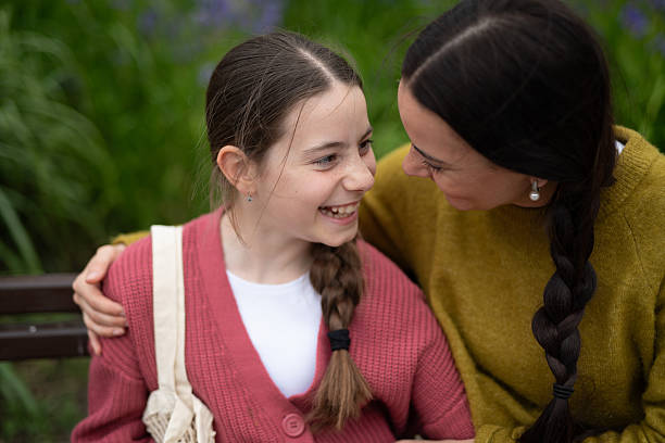 istock Tender moment between mom and and daughter, laughing together. 2230551202