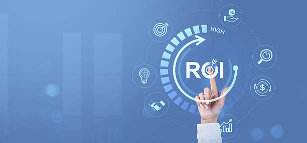 istock Hand pointing at ROI concept with digital financial icons representing high return on investment on a blue futuristic interface background. 2230553355