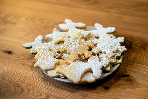 Delightful assortment of Christmas cookies on a rustic wooden table