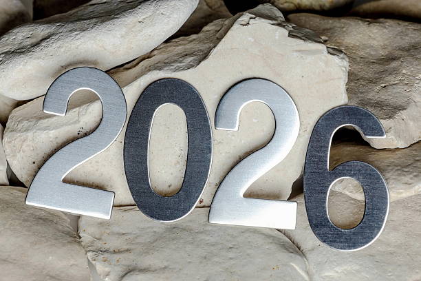istock New Year 2026 with metallic numbers on stone background 2230557600