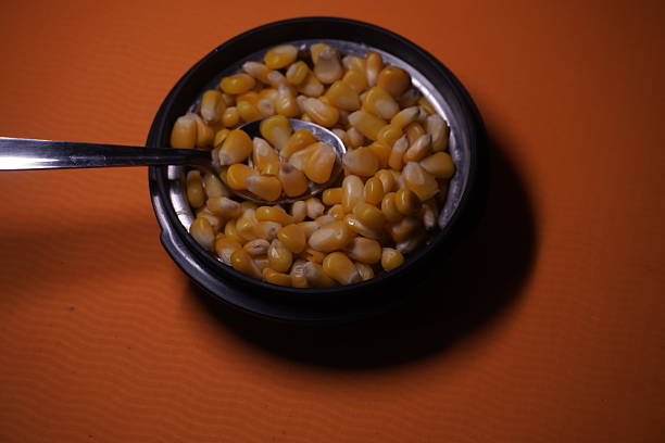 Sweet Corn : Corn kernels are small maize fruits containing a hard shell, dense starch-filled endosperm, and embryo germ essential for growth