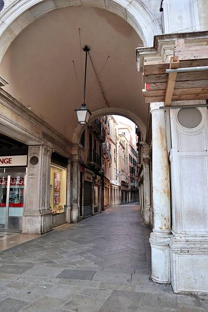 istock Morning view of the path under St Mark's Clocktower in Venice, Italy 2230573090