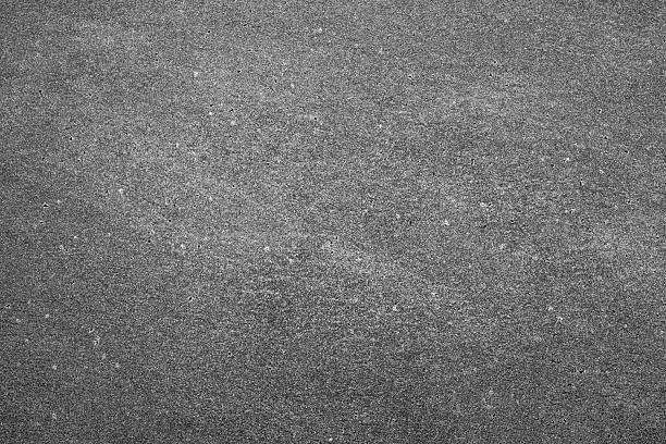 istock Rough gray cement wall texture with fine grains and small holes, backgrounds for construction themes 2230587238